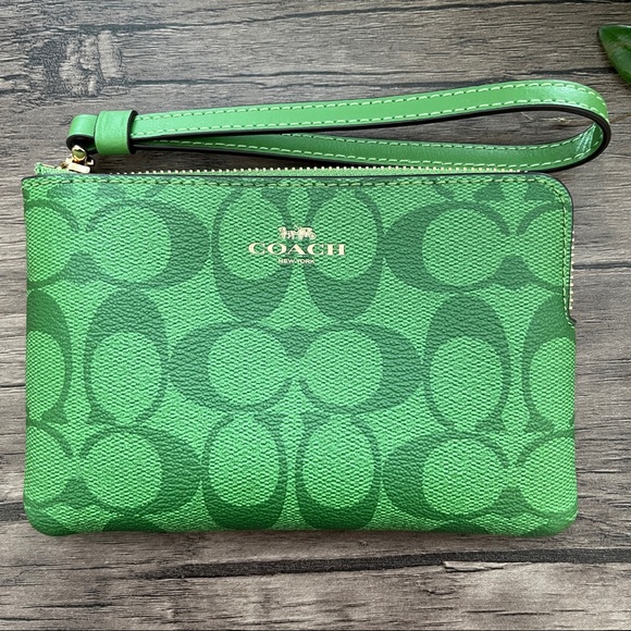 Coach Handbags - COACH SIGNATURE CANVAS CORNER ZIP WRISTLET WALLET - Green